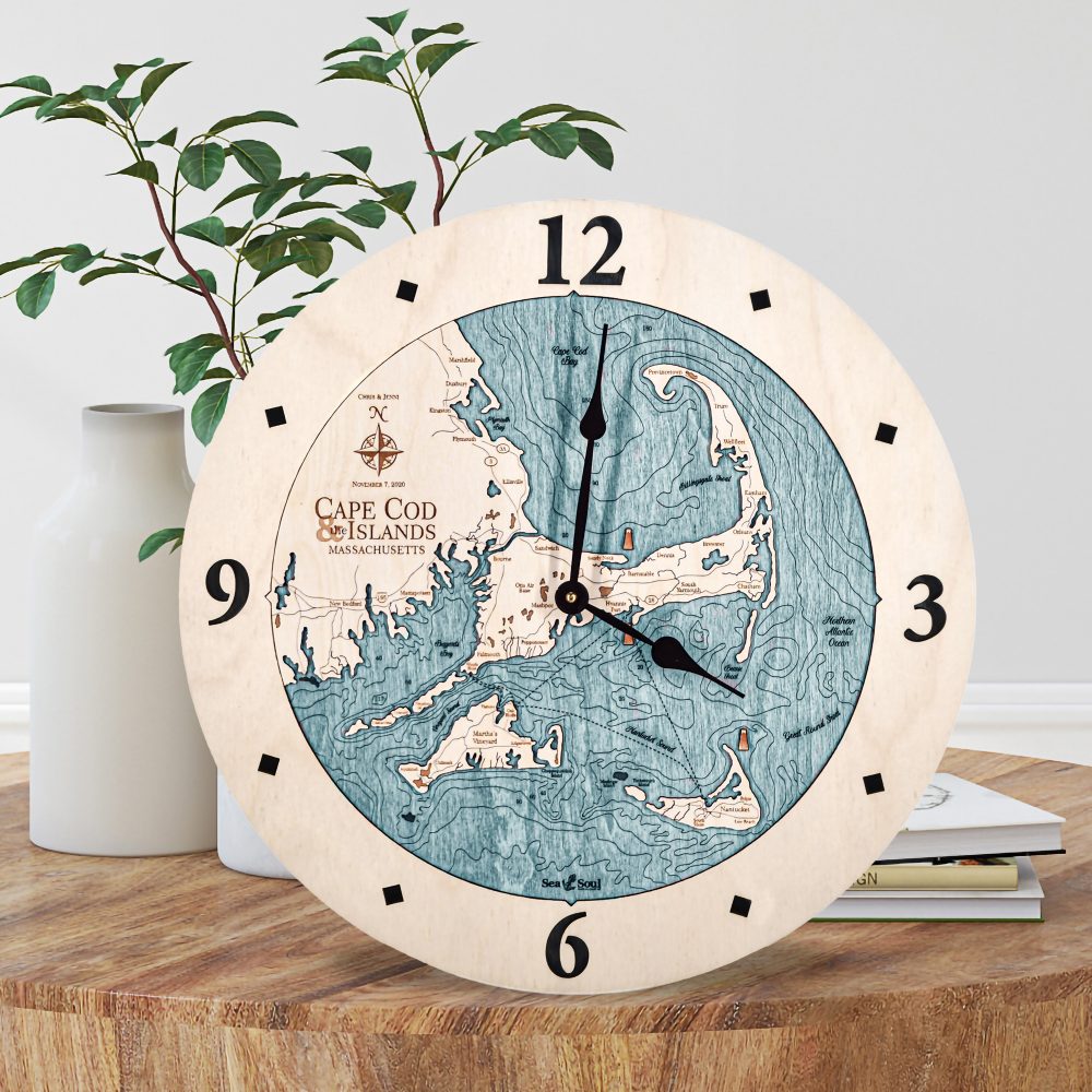 Cape Cod and Islands Nautical Clock Birch Accent with Blue Green Water Sitting on Coffee Table by Books and Vases