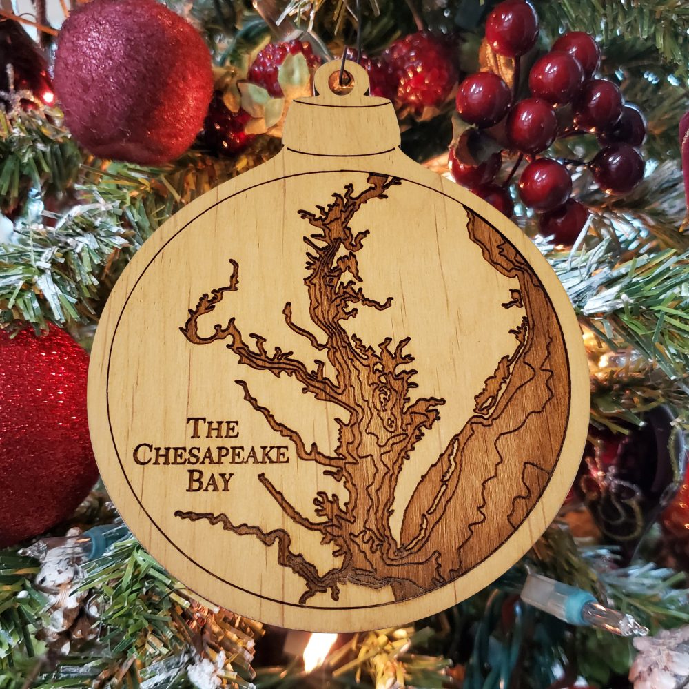 Chesapeake Bay Engraved Nautical Ornament Hanging on Christmas Tree with Red Ornaments