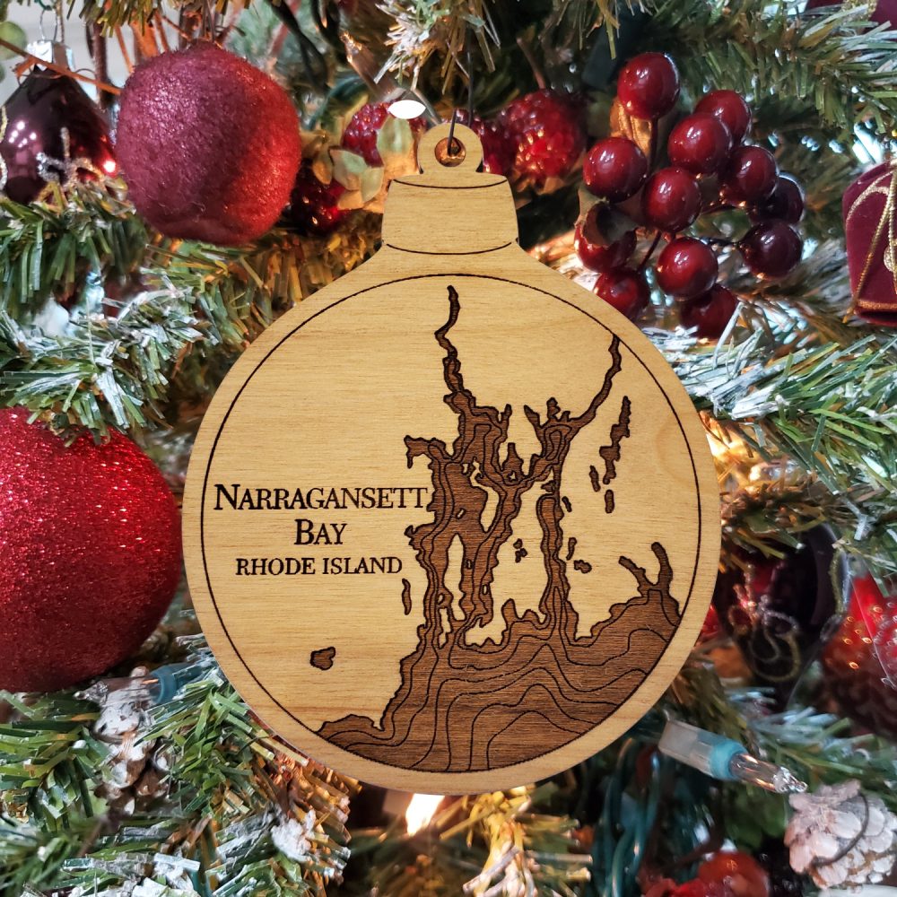 Narragansett Bay Engraved Nautical Ornament Hanging on Christmas Tree with Red Ornaments
