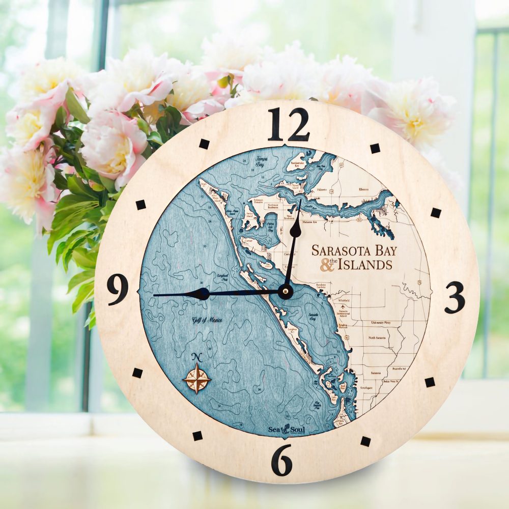 Sarasota Bay Nautical Clock Birch Accent with Blue Green Water on Windowsill with Flowers