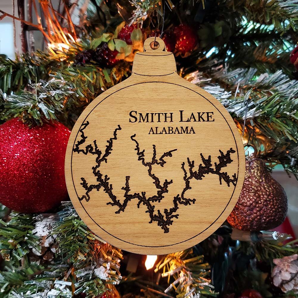 Smith Lake Engraved Nautical Ornament Hanging on Christmas Tree with Red Ornaments