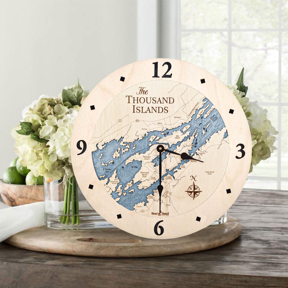 Thousand Islands Nautical Clock Birch Accent with Deep Blue Water on Table with Flowers