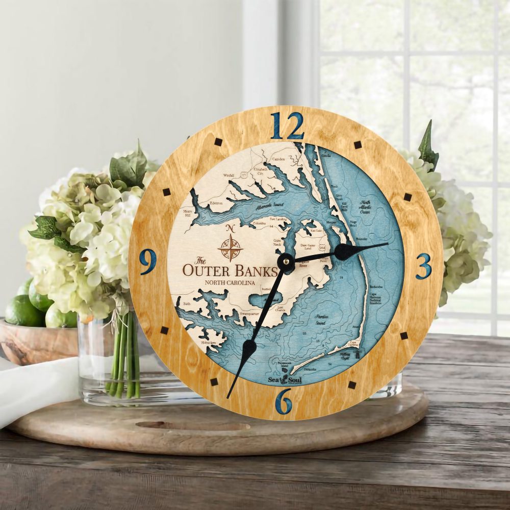 Outer Banks Nautical Clock Honey Accent with Blue Green Water on Table with Flowers