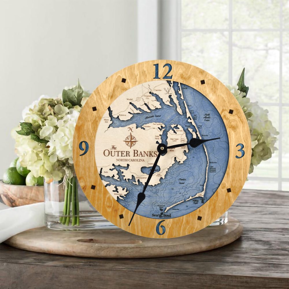 Outer Banks Nautical Clock Honey Accent with Deep Blue Water on Table with Flowers