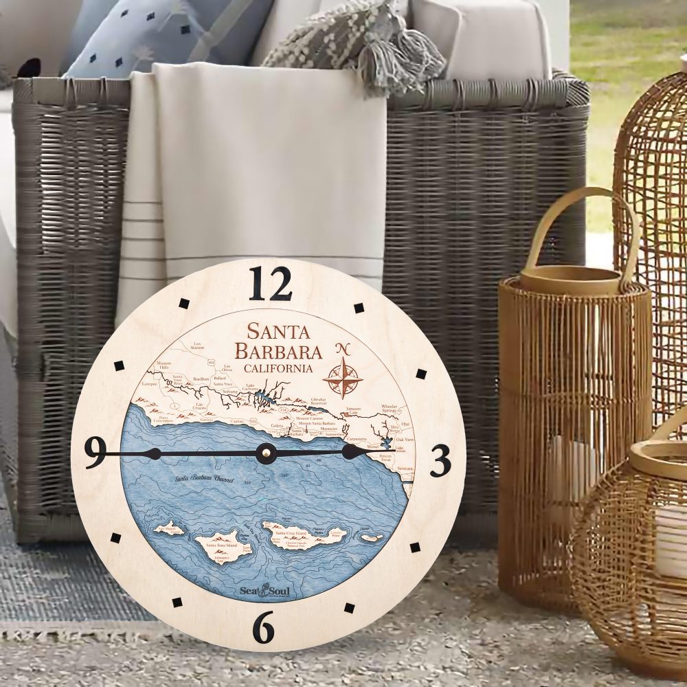 Santa Barbara Nautical Map Clock Birch Accent with Deep Blue Water Sitting on Ground by Wicker Chair