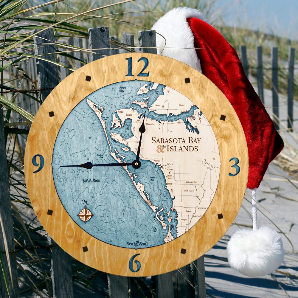 Sarasota Bay Nautical Clock Honey Accent with Blue Green Water on Fence by Beach