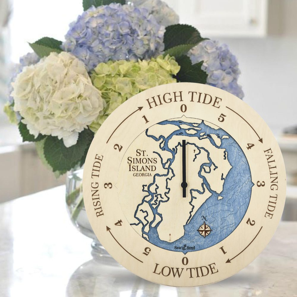 St Simons Island Tide Clock Birch Accent with Deep Blue Water Sitting on Table with Flowers