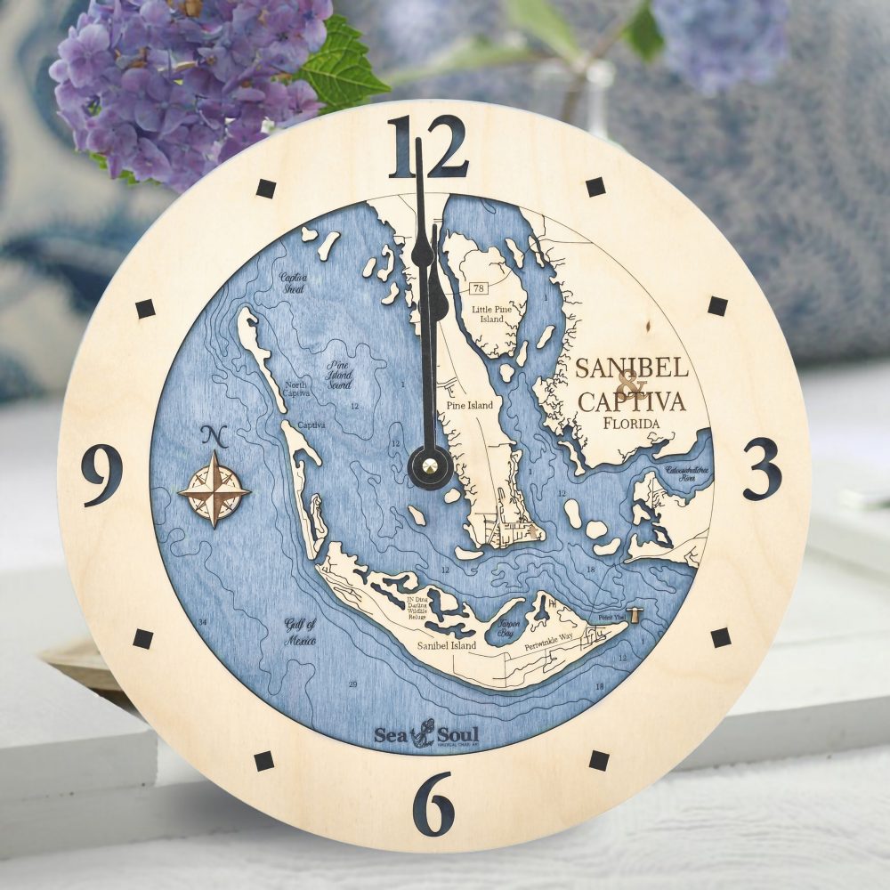 Sanibel & Captiva Nautical Clock Birch Accent with Deep Blue Water on Table with Flowers