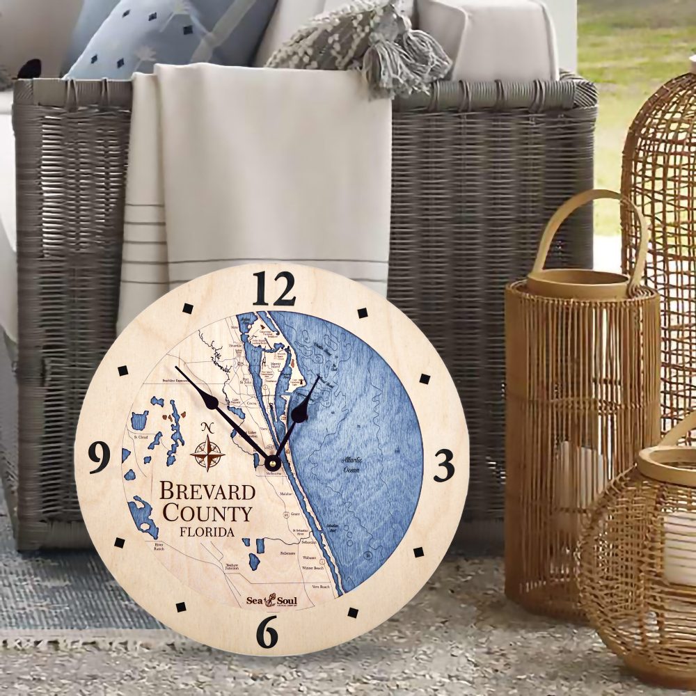 Brevard County Nautical Clock Birch Accent with Deep Blue Water on Floor Next to Chair