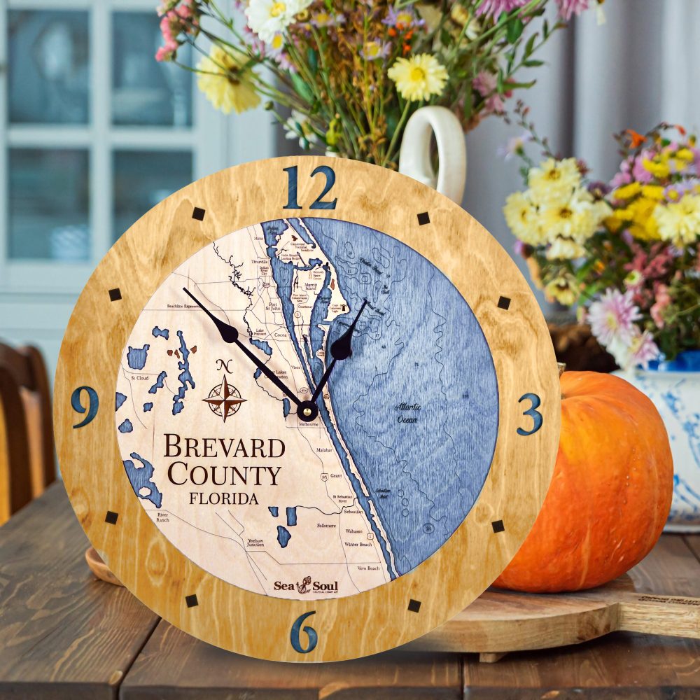 Brevard County Nautical Clock Honey Accent with Deep Blue Water on Table with Pumpkin
