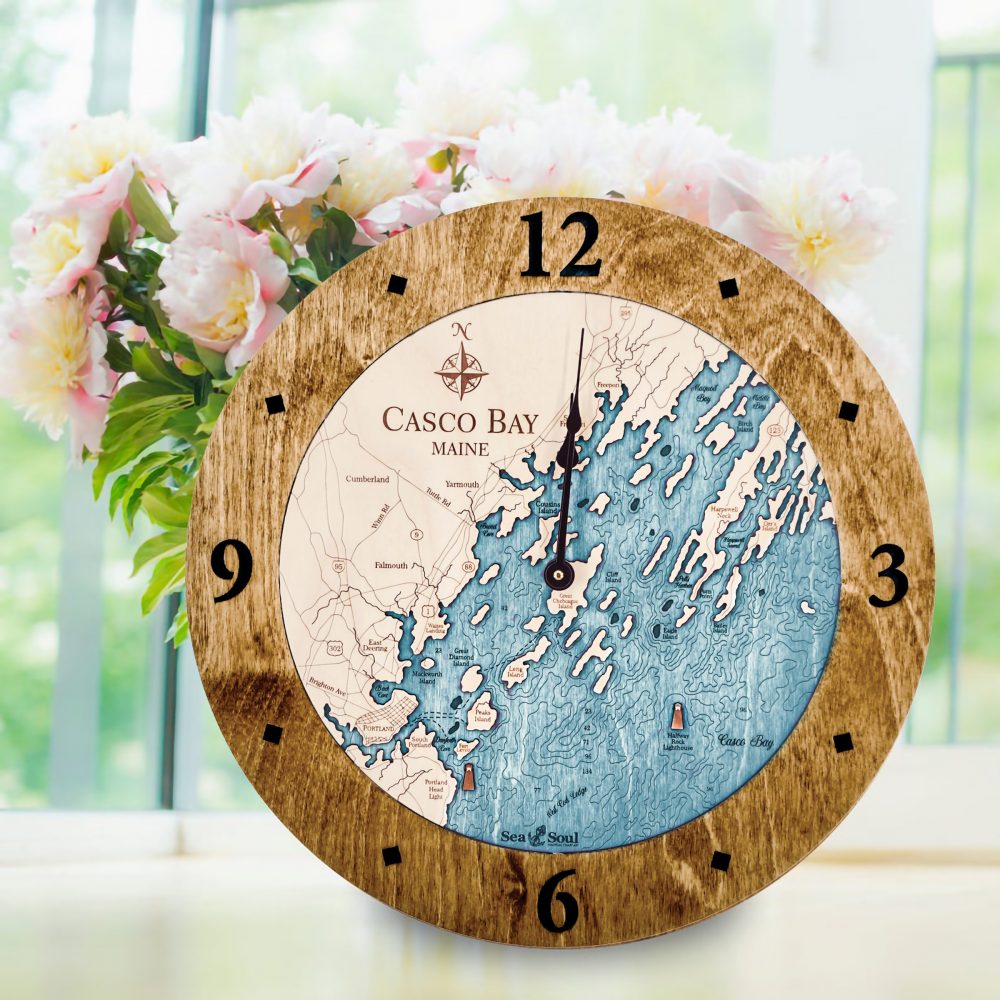 Casco Bay Nautical Clock Americana Accent with Blue Green Water on Counter Top with Flowers
