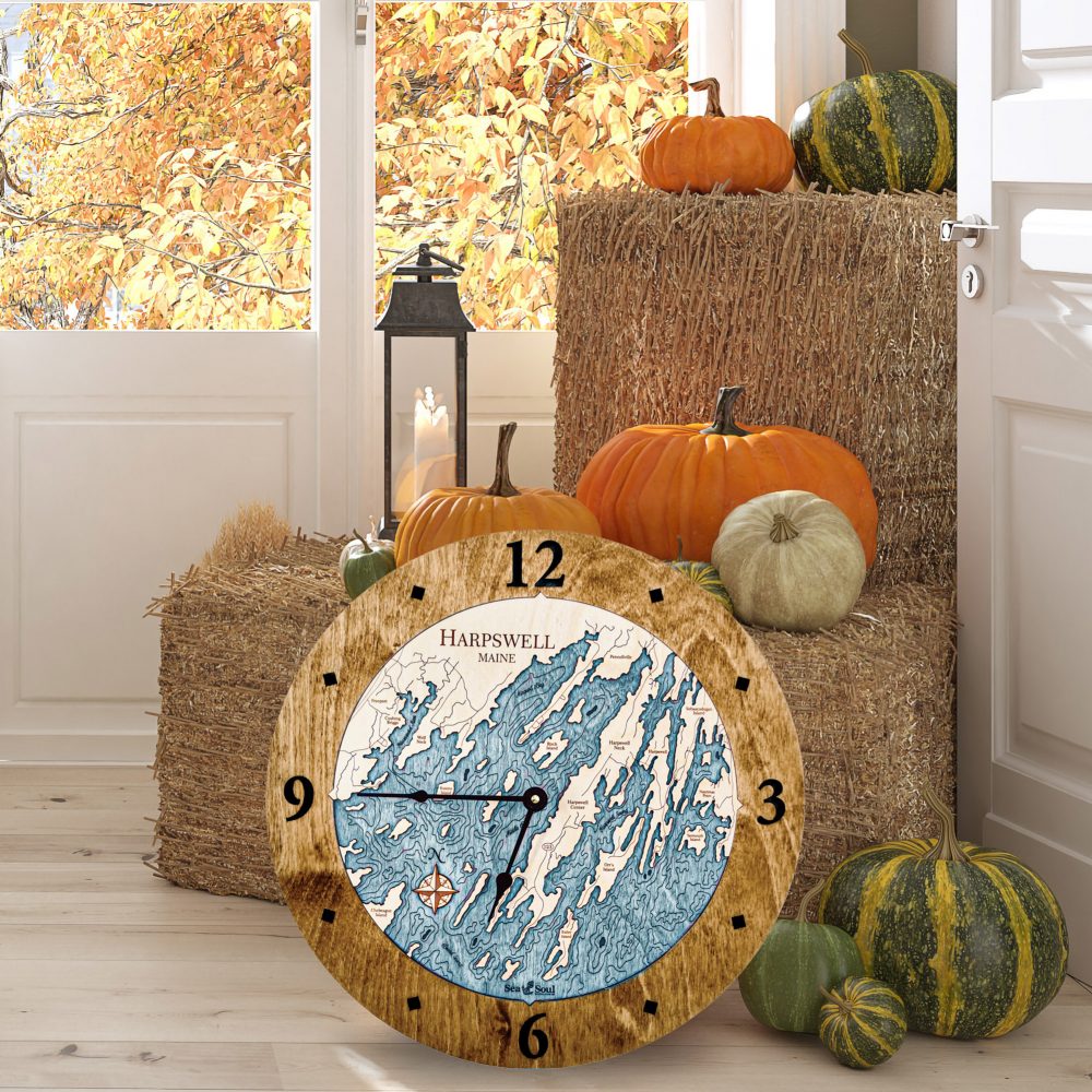 Harpswell Nautical Clock Americana Accent with Blue Green Water on Floor Next to Hay Bales