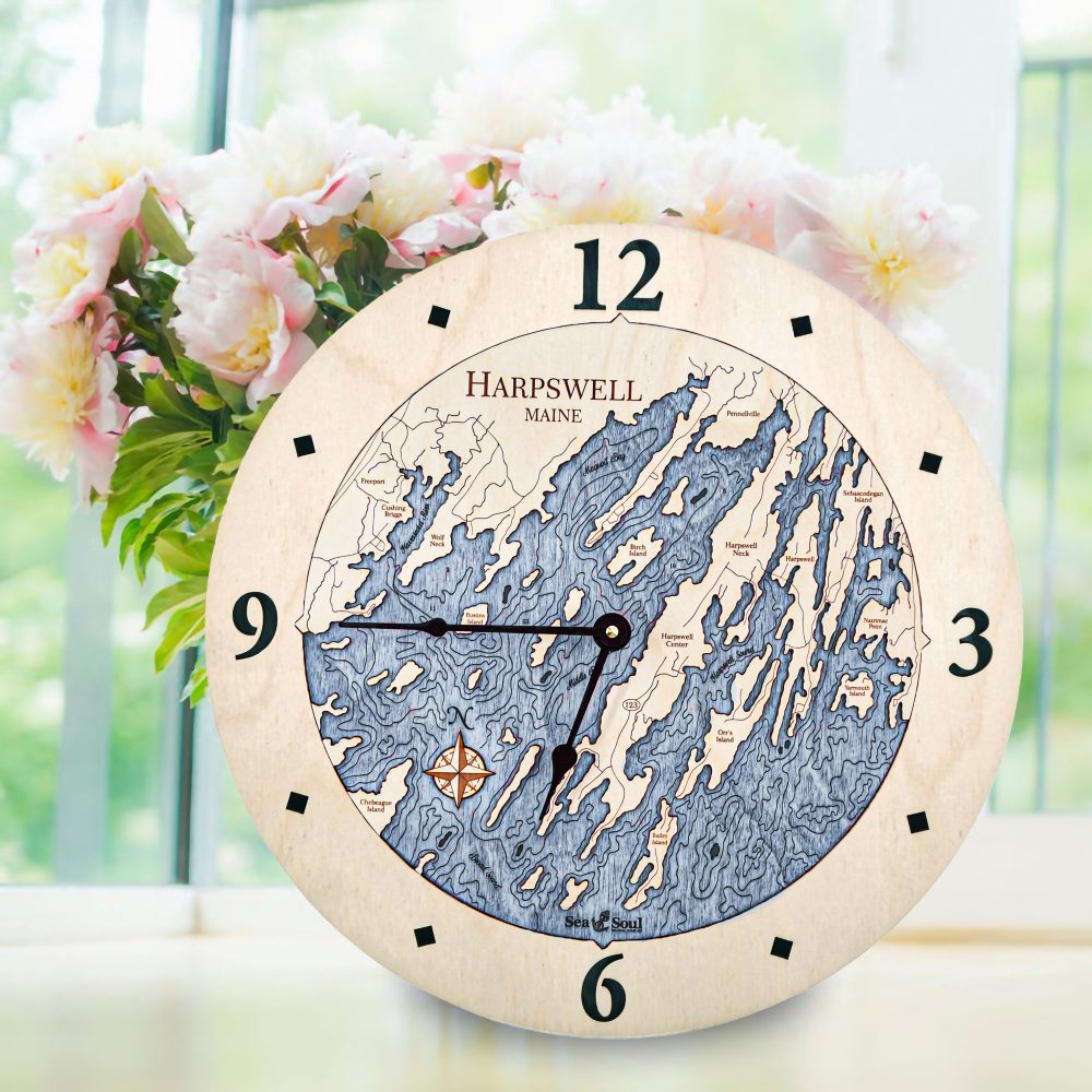 Harpswell Nautical Clock Birch Accent with Deep Blue Water on Table with Flowers