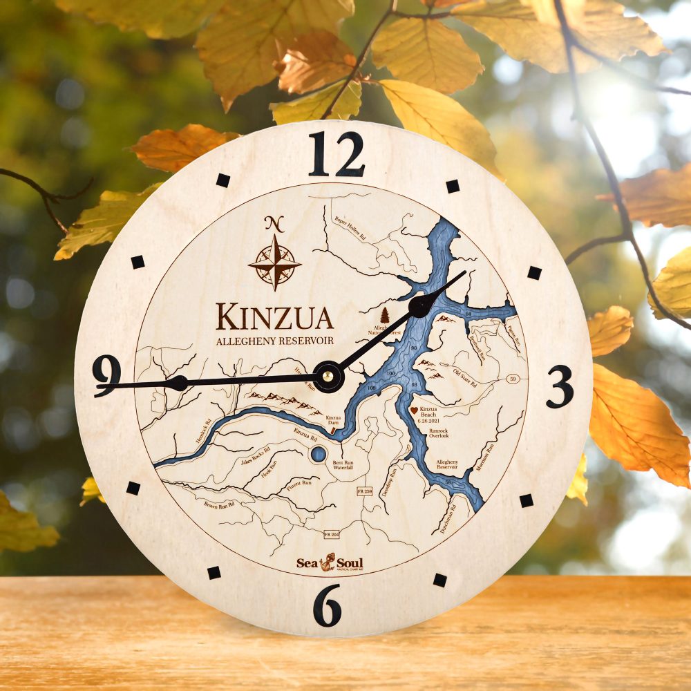 Kinzua Nautical Clock Birch Accent with Deep Blue Water on Table by Fall Leaves