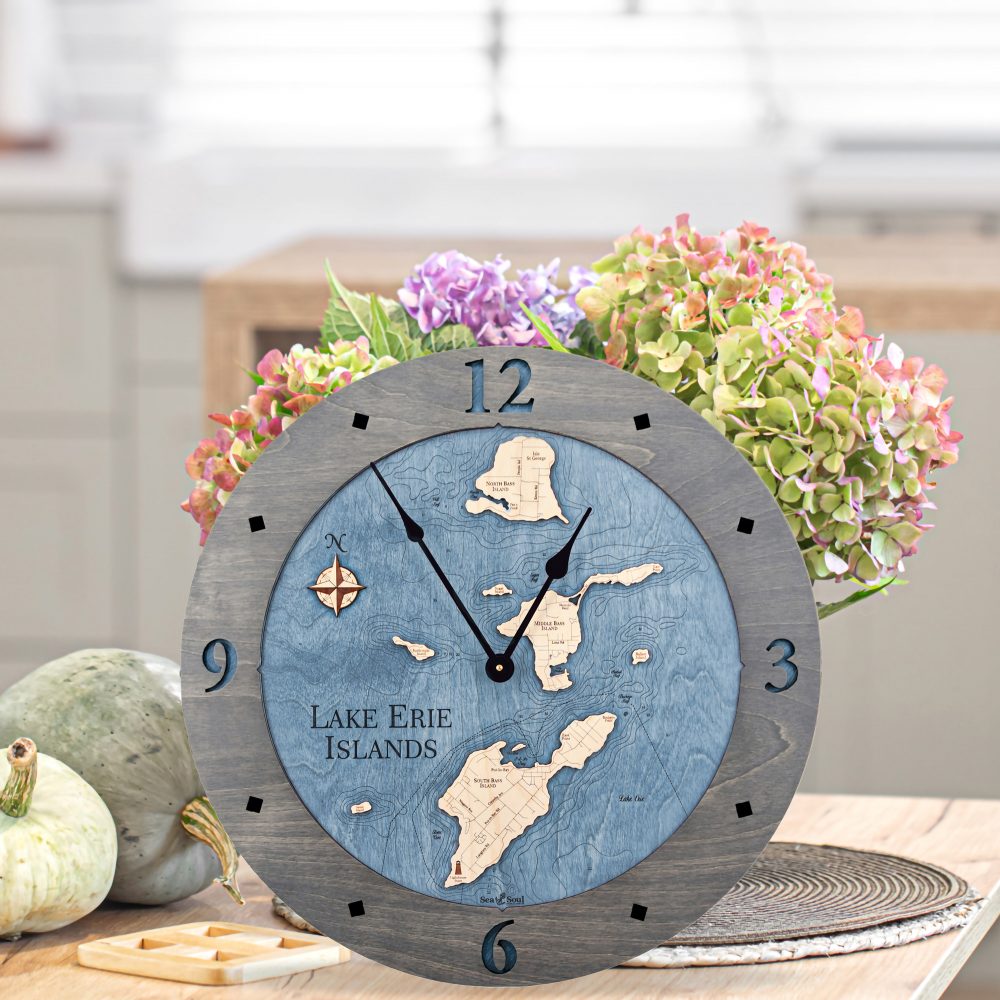 Lake Erie Islands Nautical Clock Driftwood Accent with Deep Blue Water on Table with Flowers