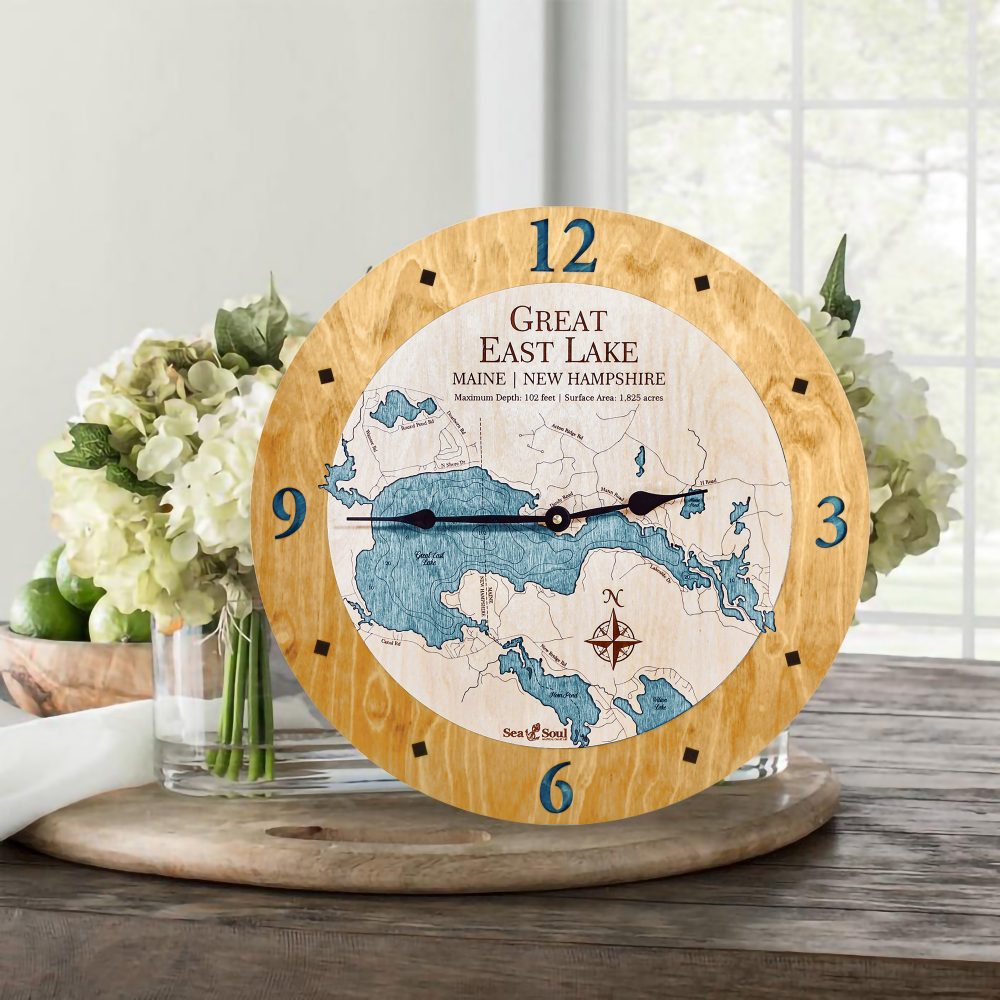 Great East Lake Nautical Clock Honey Accent with Blue Green Water on Table with Flowers