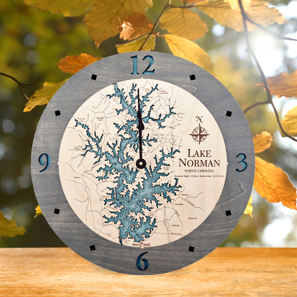 Lake Norman Nautical Clock Driftwood Accent with Blue Green Water on Table by Fall Leaves