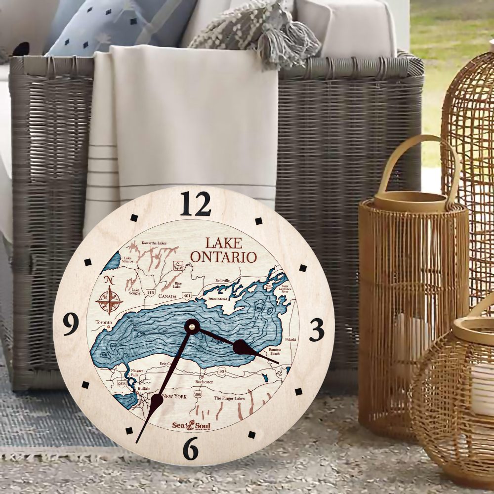 Lake Ontario Nautical Clock Birch Accent with Blue Green Water on Floor by Wicker Chair