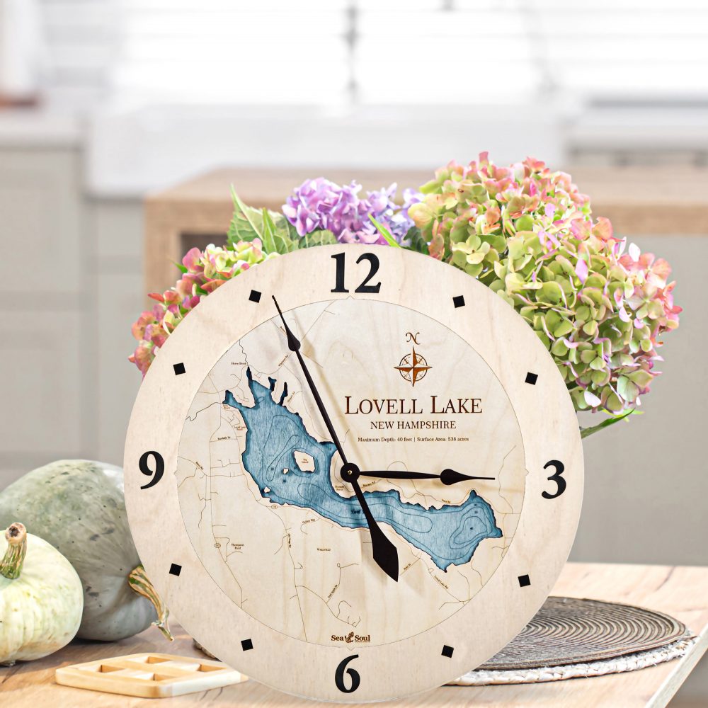 Lovell Lake Nautical Clock Birch Accent with Blue Green Water on Table with Flowers and Pumpkin