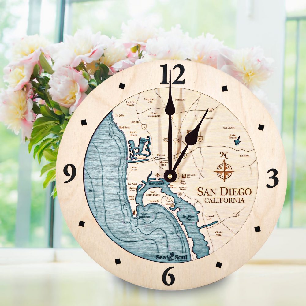 San Diego Bay Nautical Clock Birch Accent with Blue Green Water on Table with Flowers
