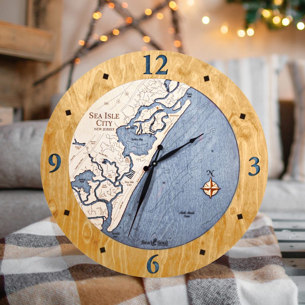 Sea Isle Nautical Clock Honey Accent with Deep Blue Water on Table with Blanket
