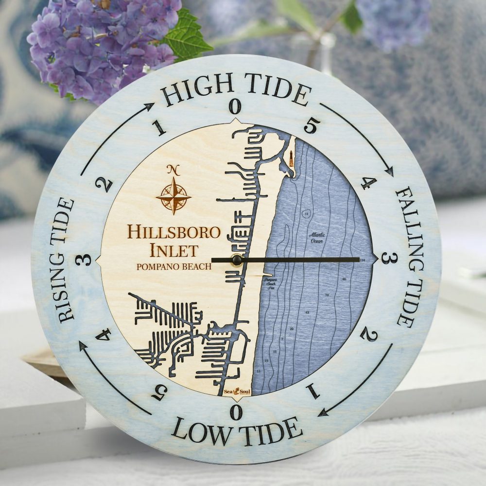 Hillsboro Inlet Tide Clock Bleach Blue Accent with Deep Blue Water on Table with Flowers