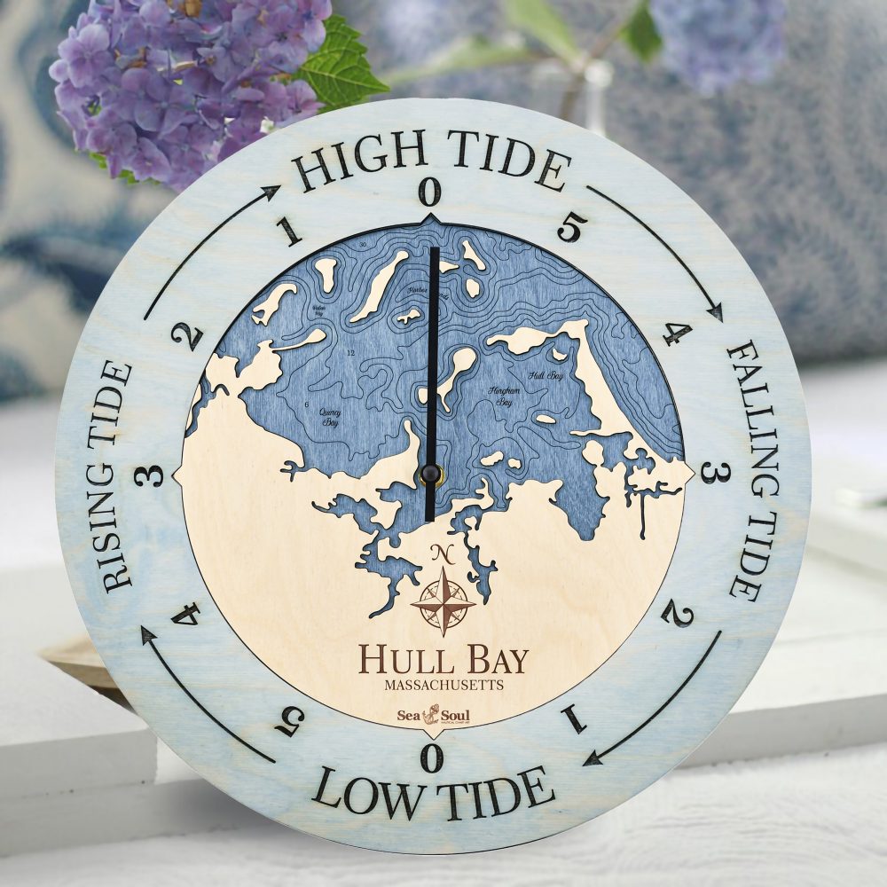 Hull Bay Tide Clock Bleach Blue Accent with Deep Blue Water Sitting on Table with Flowers