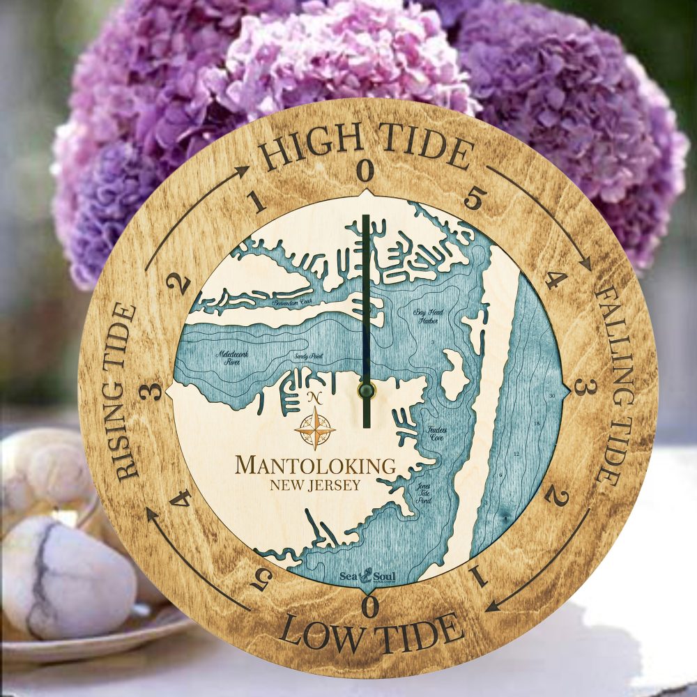 Mantoloking Tide Clock Honey Accent with Blue Green Water Sitting on Table with Flowers
