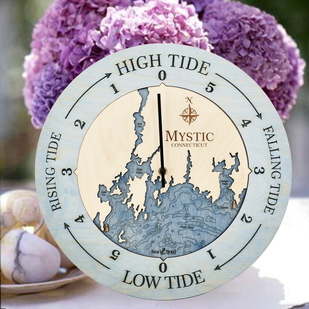 Mystic Connecticut Tide Clock Bleach Blue Accent with Deep Blue Water on Table with Flowers