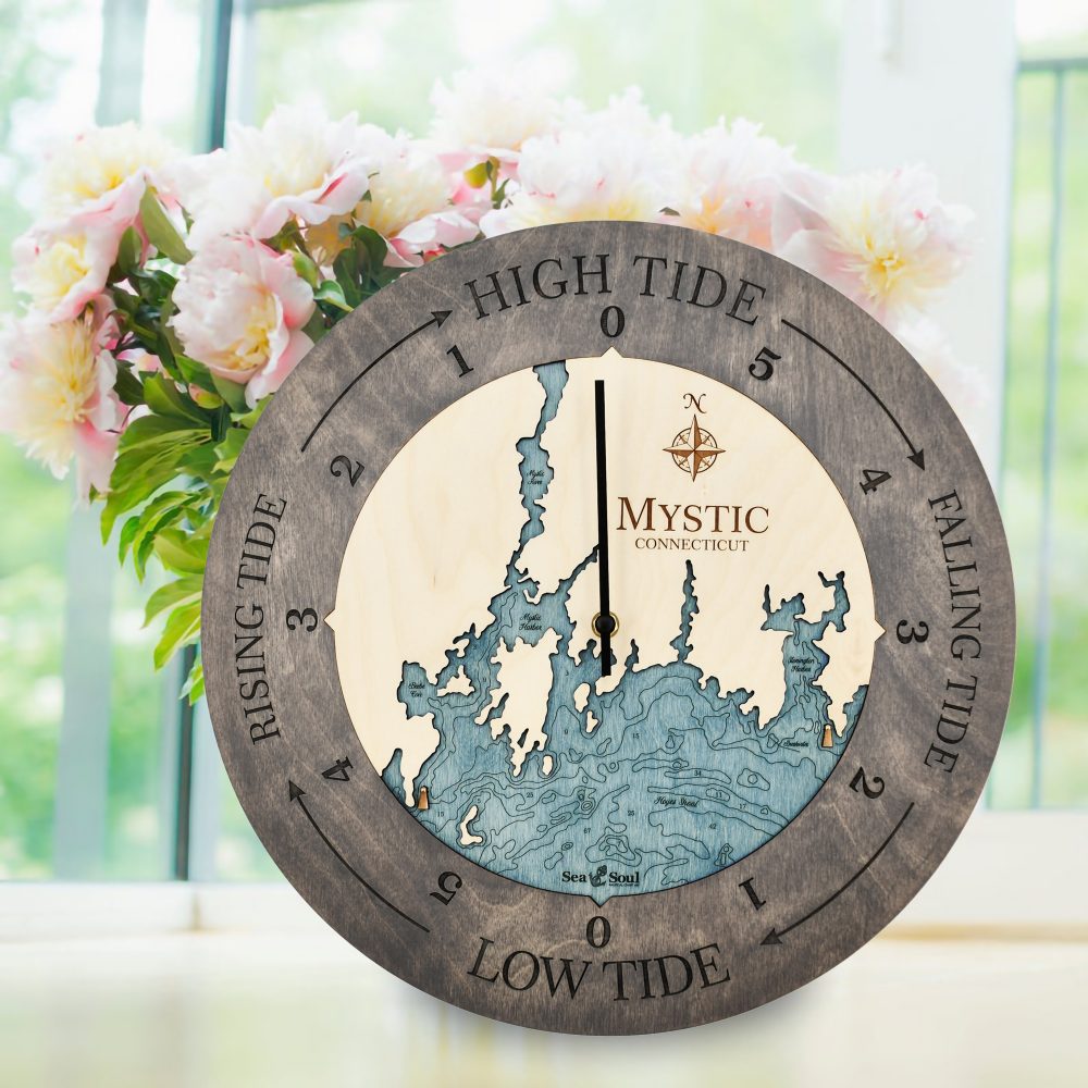 Mystic Connecticut Tide Clock Driftwood Accent with Blue Green Water on Windowsill with Flowers