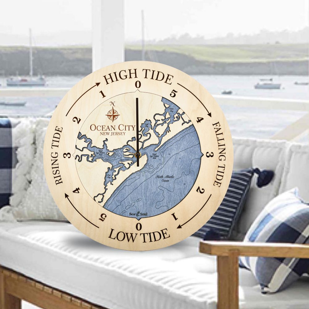 Ocean City Tide Clock Birch Accent with Deep Blue Water Sitting on Outdoor Couch by Waterfront