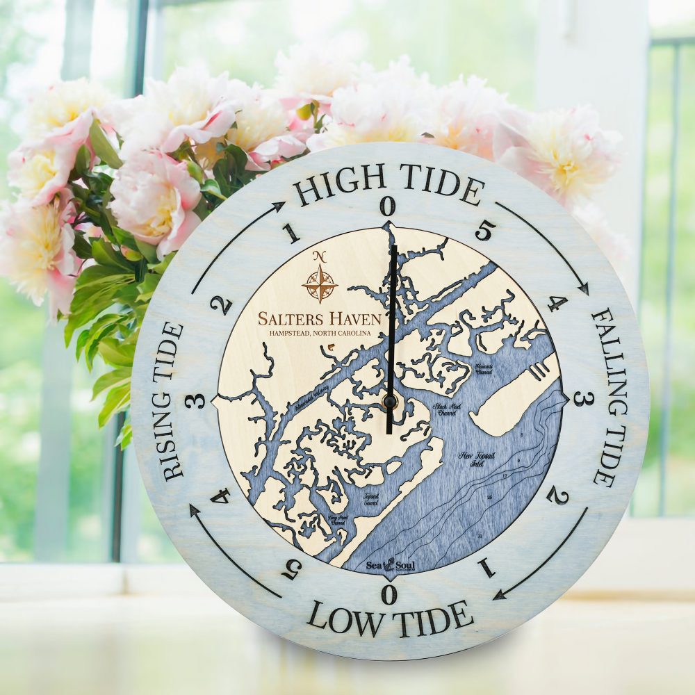 Salters Haven Tide Clock Bleach Blue Accent with Deep Blue Water on Windowsill with Flowers