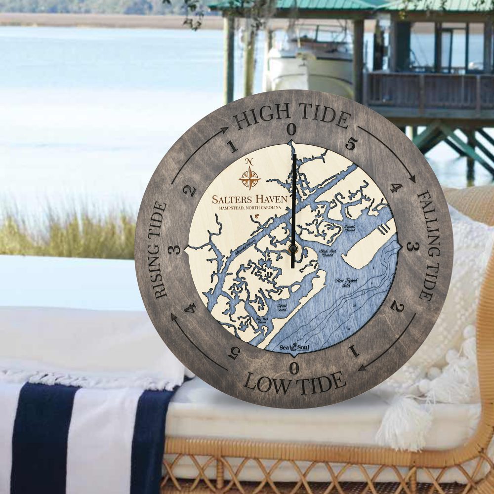 Salters Haven Tide Clock Driftwood Accent with Deep Blue Water Sitting on Lounge Chair