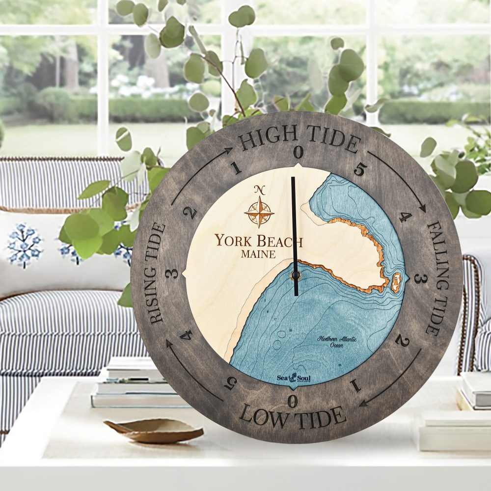 York Beach Tide Clock Driftwood Accent with Blue Green Water Sitting on Coffee Table with Potted Plant