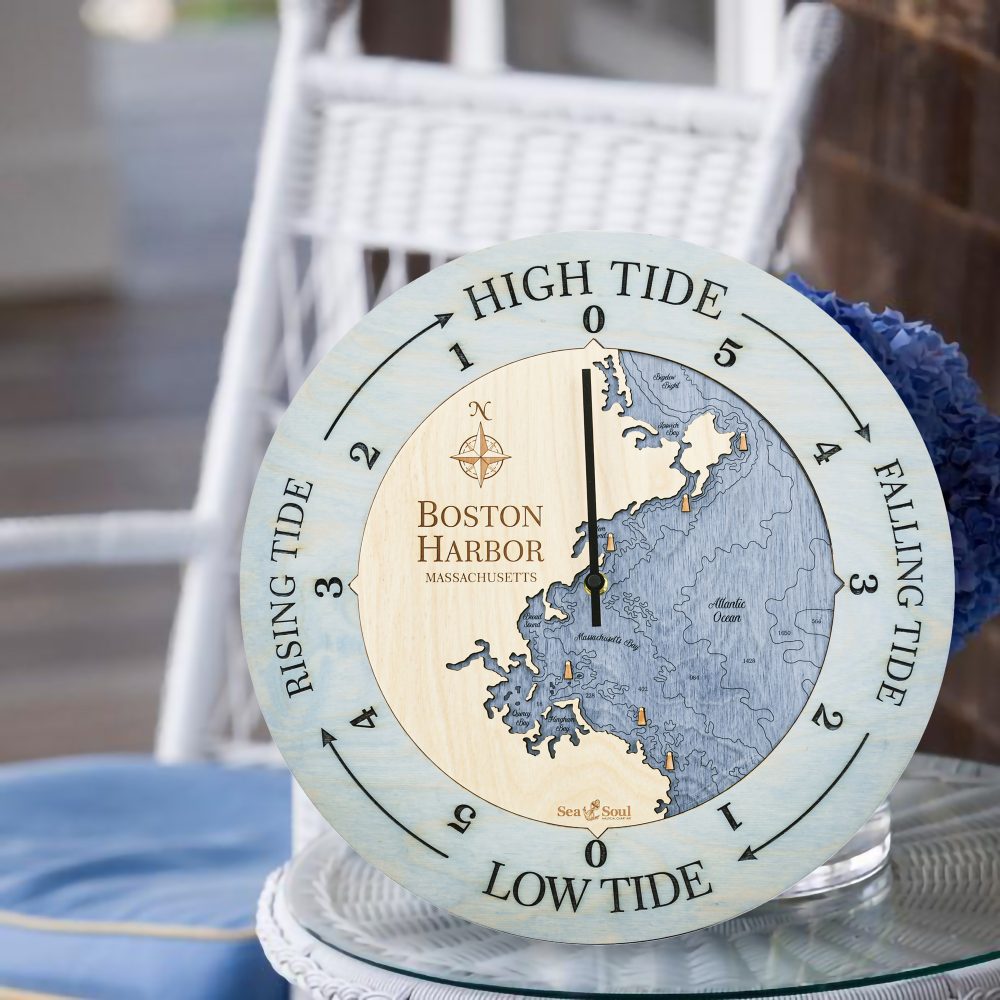 Boston Harbor Tide Clock Bleach Blue Accent with Deep Blue Water Sitting on Table with Flowers