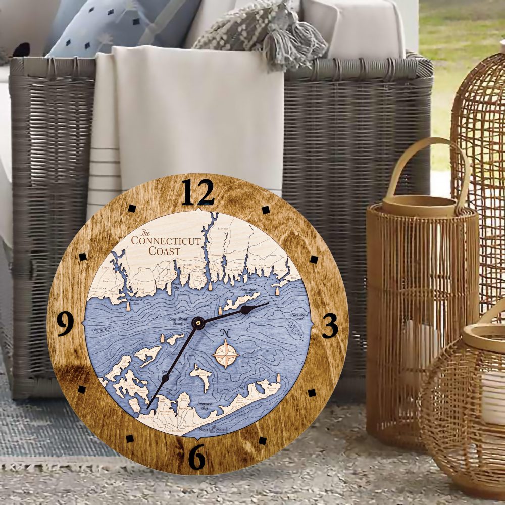 Connecticut Coast Nautical Clock Americana Accent with Deep Blue Water Sitting on Floor by Wicker Chair