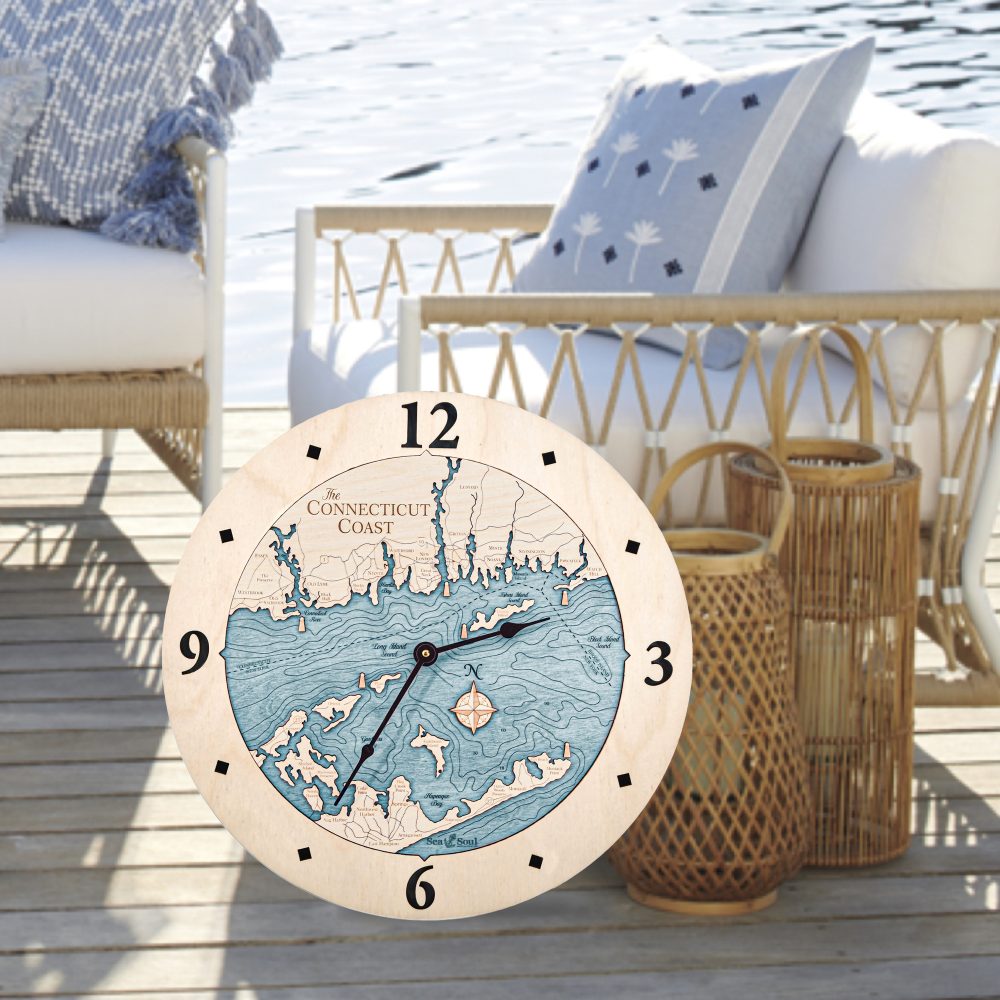 Connecticut Coast Nautical Clock Birch Accent with Blue Green Water Sitting on Floor by Outdoor Chair