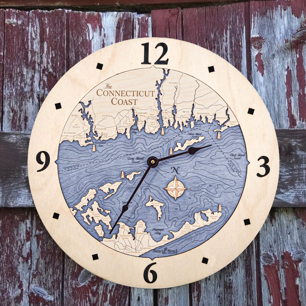 Connecticut Coast Nautical Clock Birch Accent with Deep Blue Water Hanging on Fence