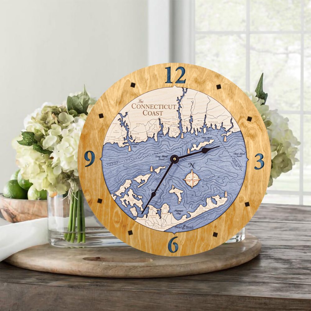 Connecticut Coast Nautical Clock Honey Accent with Deep Blue Water Sitting on Table with Flowers