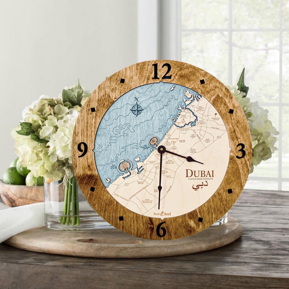 Dubai Nautical Clock Americana Accent with Blue Green Water Sitting on Table with Flowers