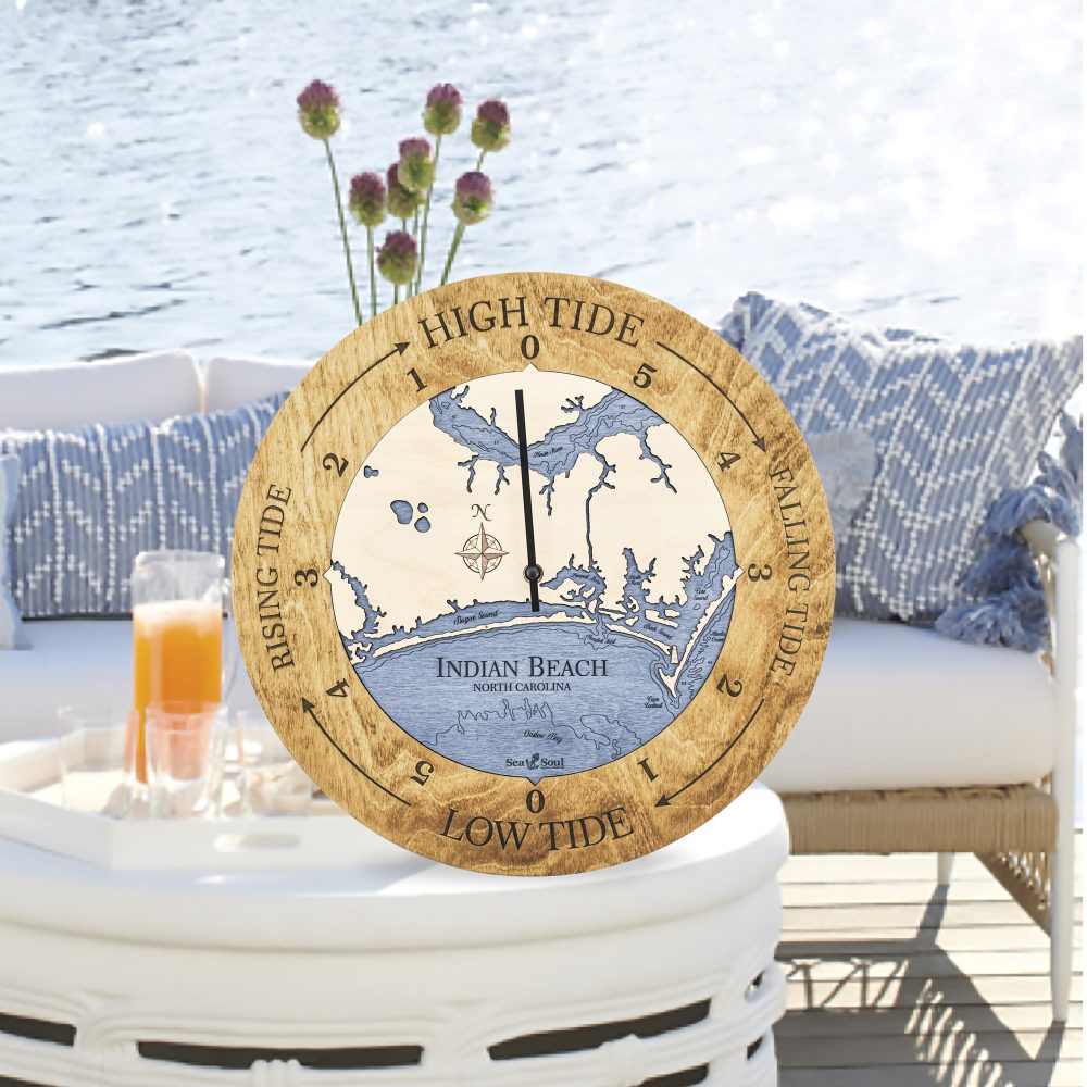 Indian Beach Tide Clock Honey Accent with Deep Blue Water Sitting on Outdoor Table by Waterfront