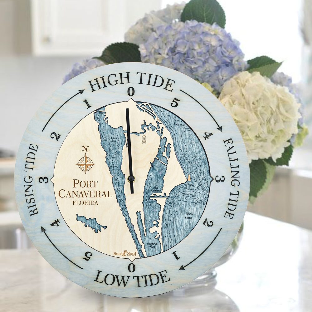 Port Canaveral Tide Clock Bleach Blue Accent with Blue Green Water Sitting on Countertop with Flowers