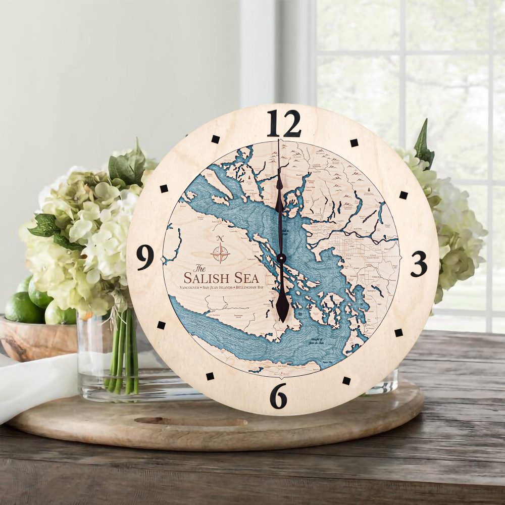 Salish Sea Nautical Clock Birch Accent with Blue Green Water Sitting on Table with Flowers