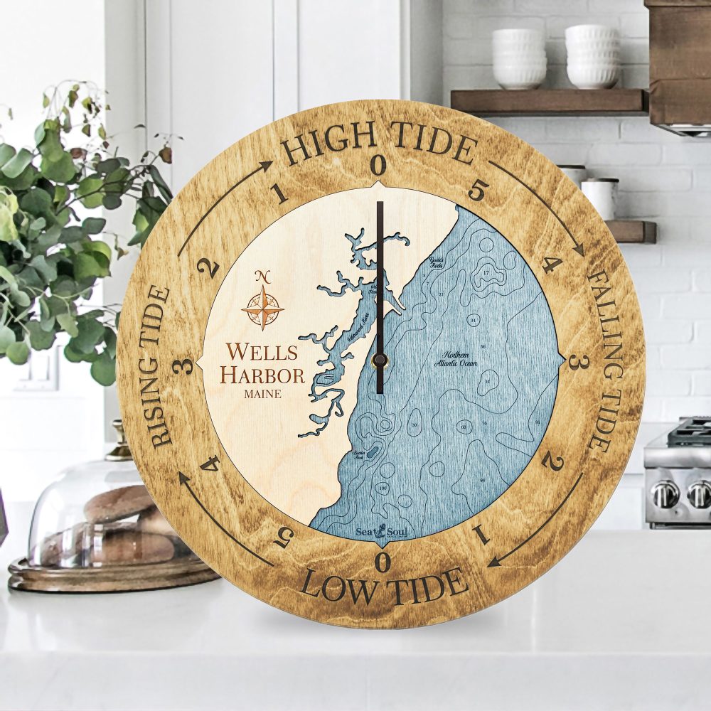 Wells Harbor Tide Clock Honey Accent with Blue Green Water Sitting on Countertop