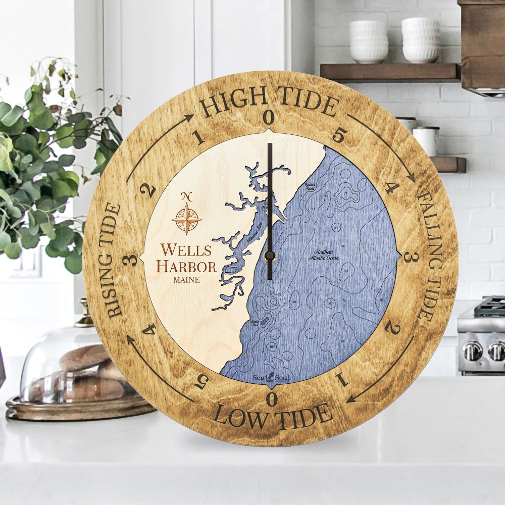 Wells Harbor Tide Clock Honey Accent with Deep Blue Water Sitting on Countertop