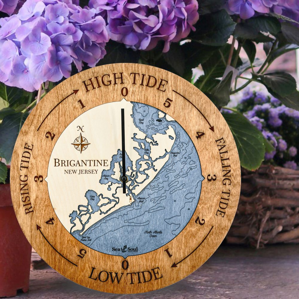 Brigantine Tide Clock Americana Accent with Deep Blue Water Sitting by Flower Pot