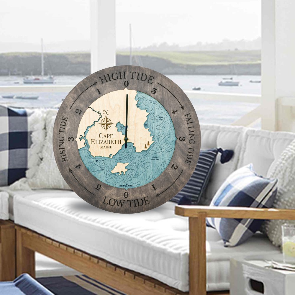 Cape Elizabeth Tide Clock Driftwood Accent with Blue Green Water Sitting on Outdoor Couch