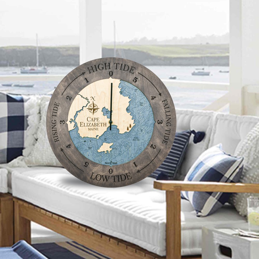 Cape Elizabeth Tide Clock Driftwood Accent with Deep Blue Water Sitting on Outdoor Couch