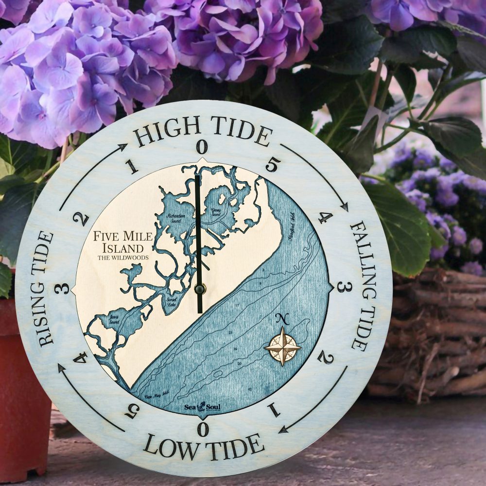 Five Mile Island Tide Clock Bleach Blue Accent with Blue Green Water Sitting by Flower Pot