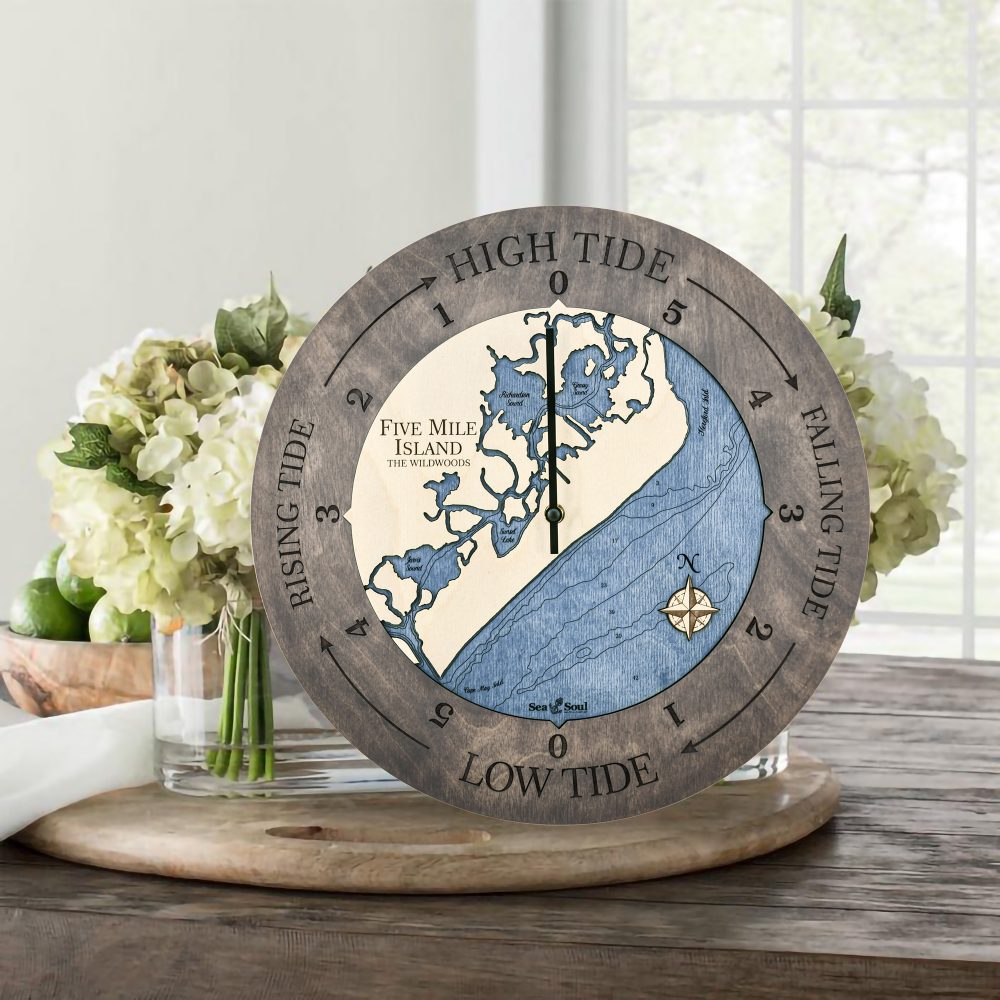 Five Mile Island Tide Clock Driftwood Accent with Deep Blue Water Sitting on Table with Flowers